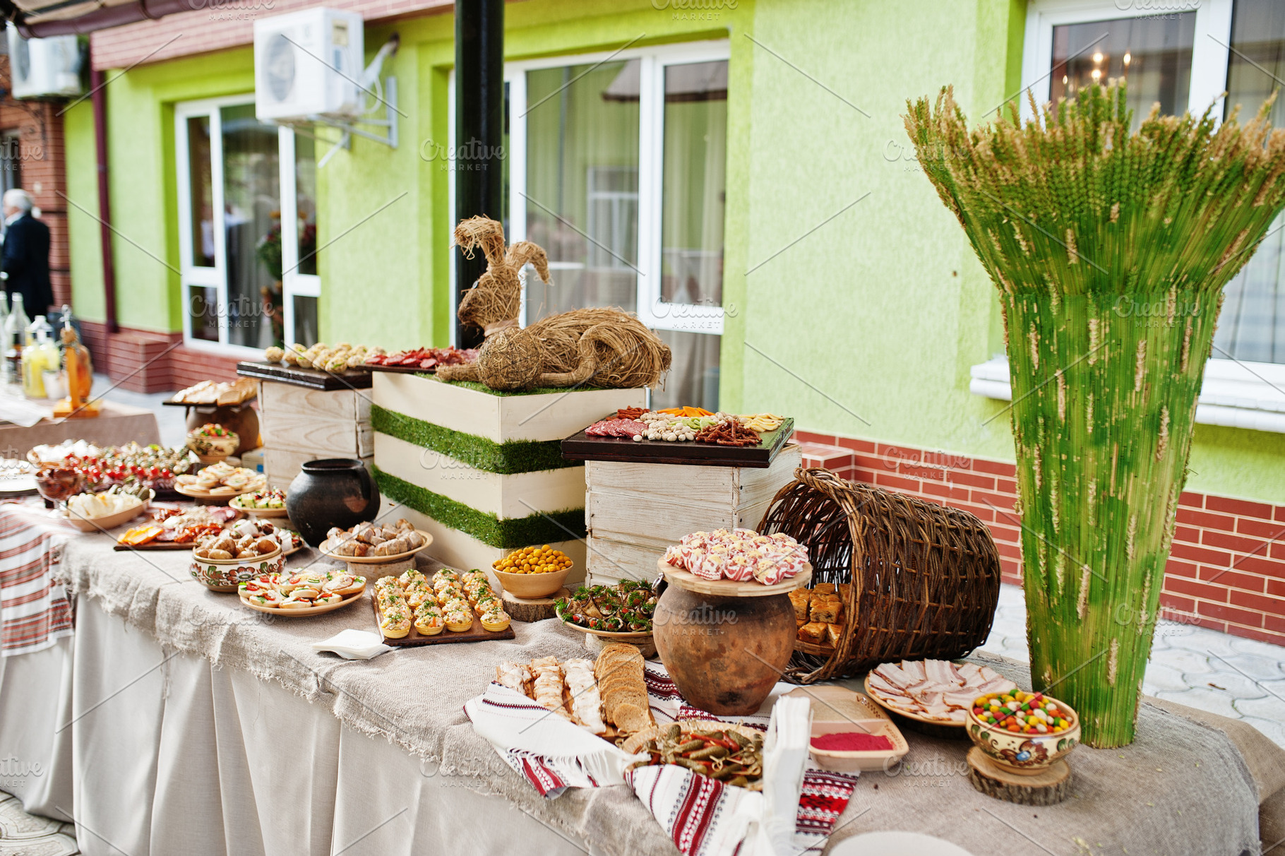Buffet table of reception with cold snacks, meat and salads., a Photo by AS photostudio