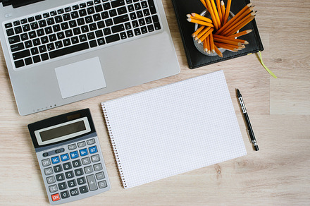 Work office desk table with laptop tablet supplies and calculator top view, a Business Photo by ok_kate