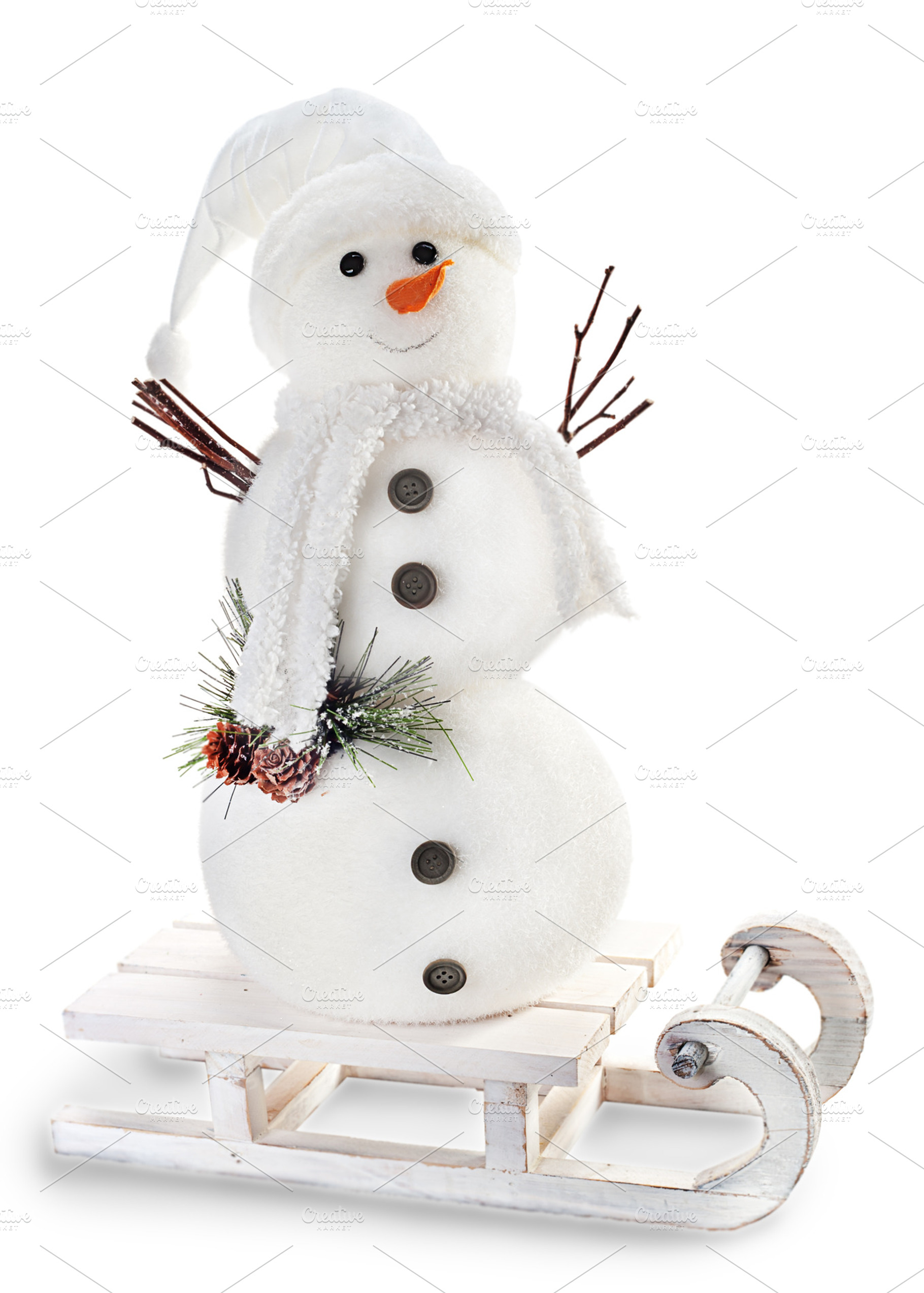Snowman on sled isolated on white ba, a Photo by PhIllStudio
