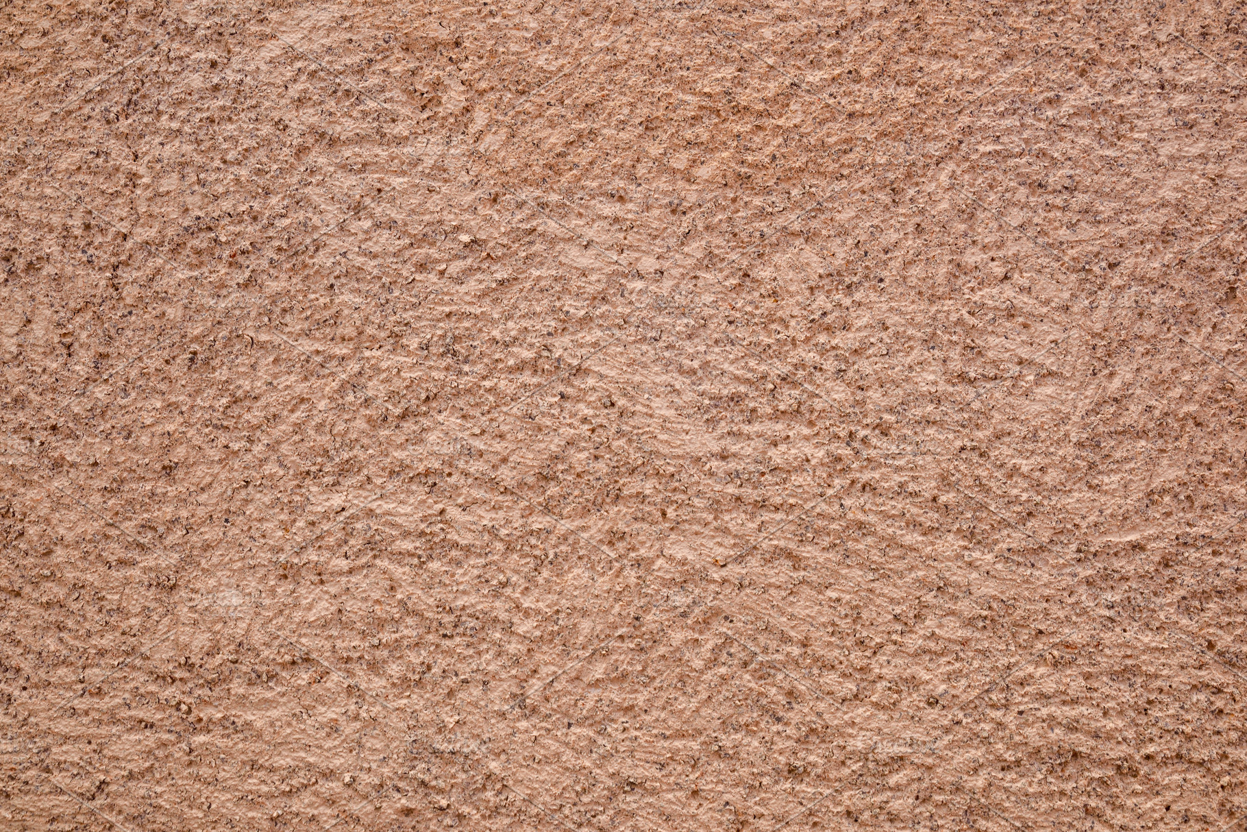 Rough brown painted exterior facade cement wall, a Photo by Davizro's Market