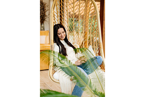 Relaxed woman taking a break, a Person Photo by HalfPoint