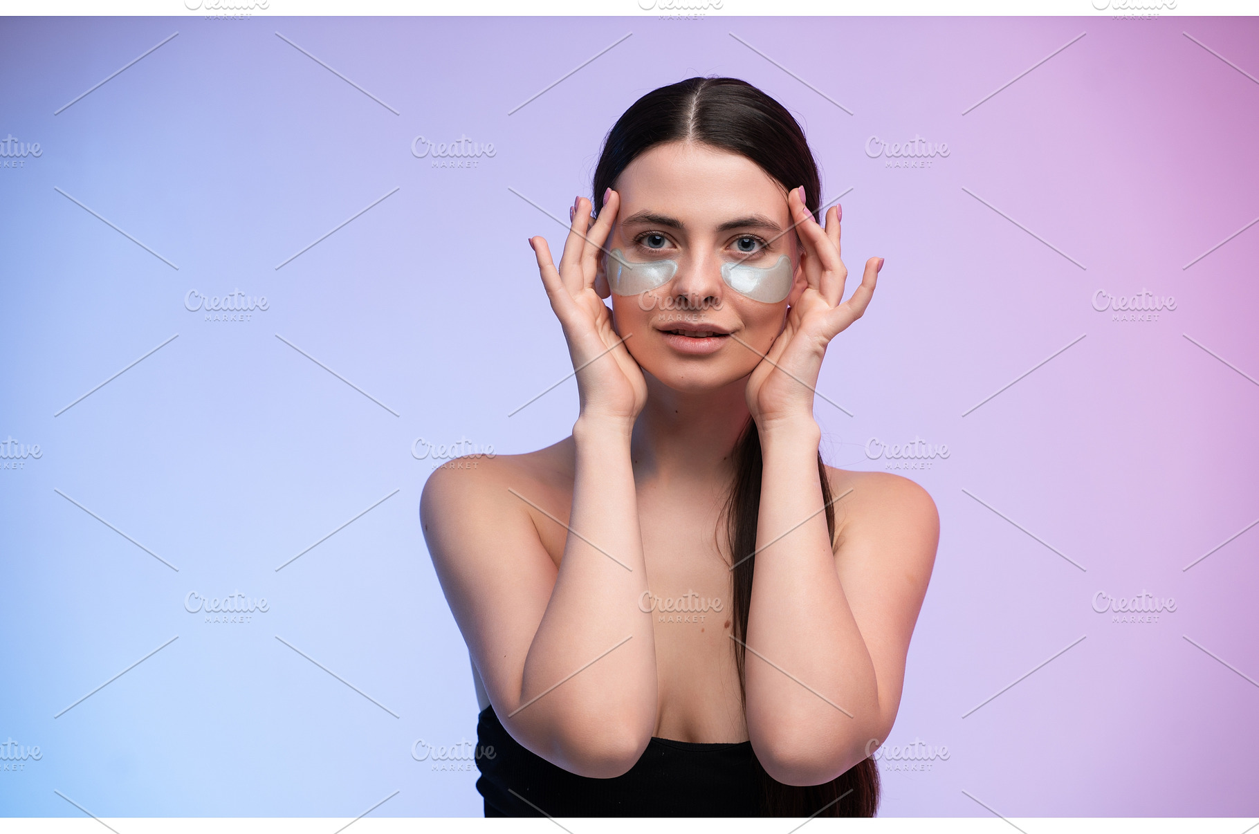 Young woman applying cosmetic eye, a Health & Medical Photo by volodymyrshtun13795