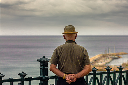 Older man looking out to sea