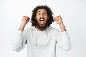 Excited sport fan, watching game, a Person Photo by Cookie Studio