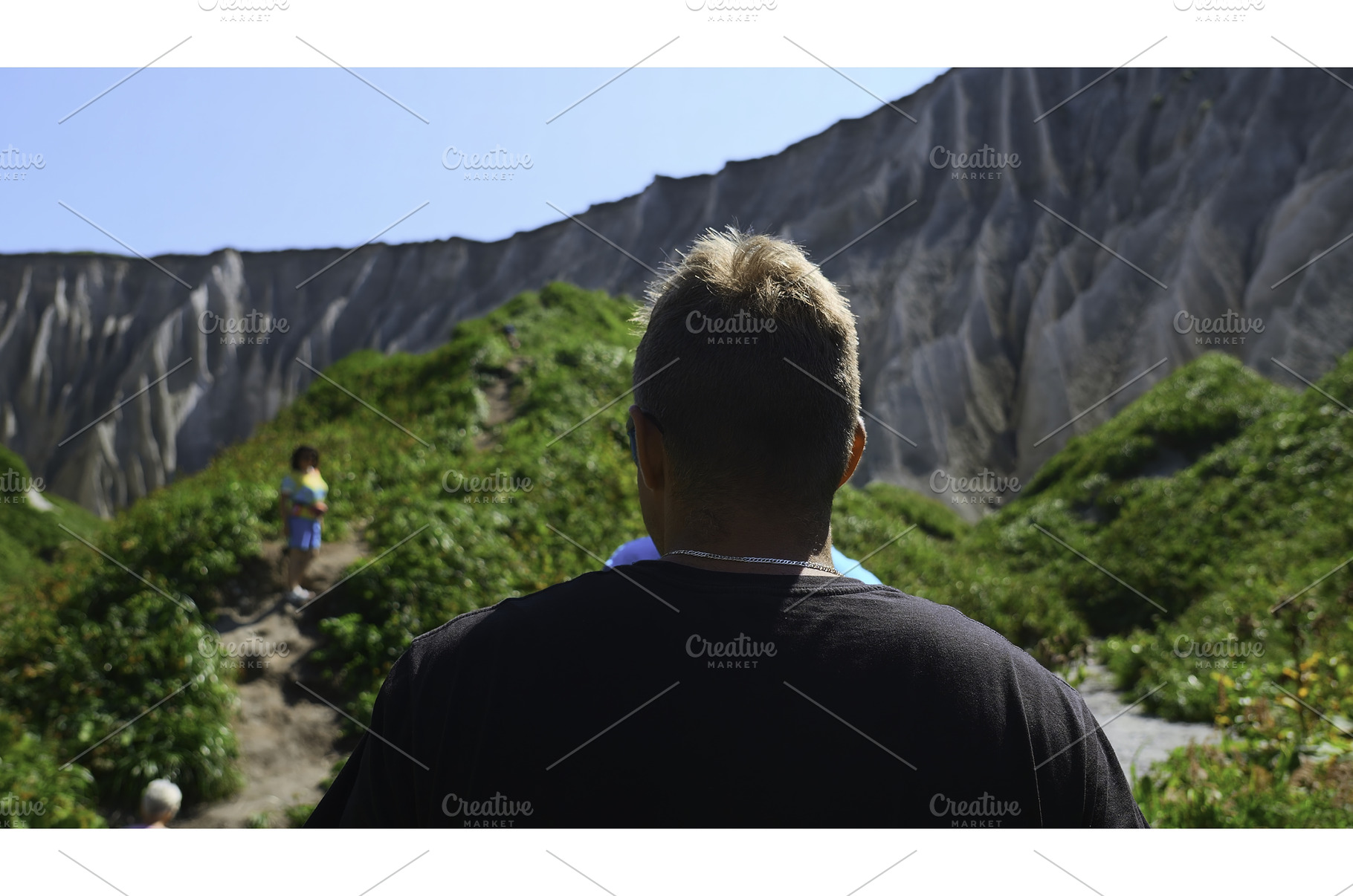 Group of people walks along hiking, a Person Photo by Media Whale Stock