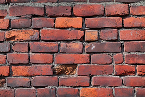 Old red brick wall texture backgroun, a Photo by Pixeness Studio