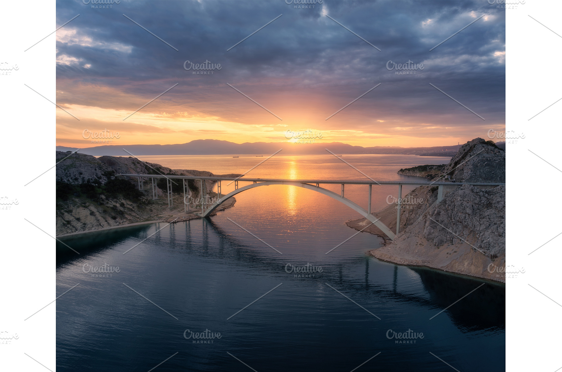 Aerial view of bridge and blue sea, an Architecture Photo by den-belitsky