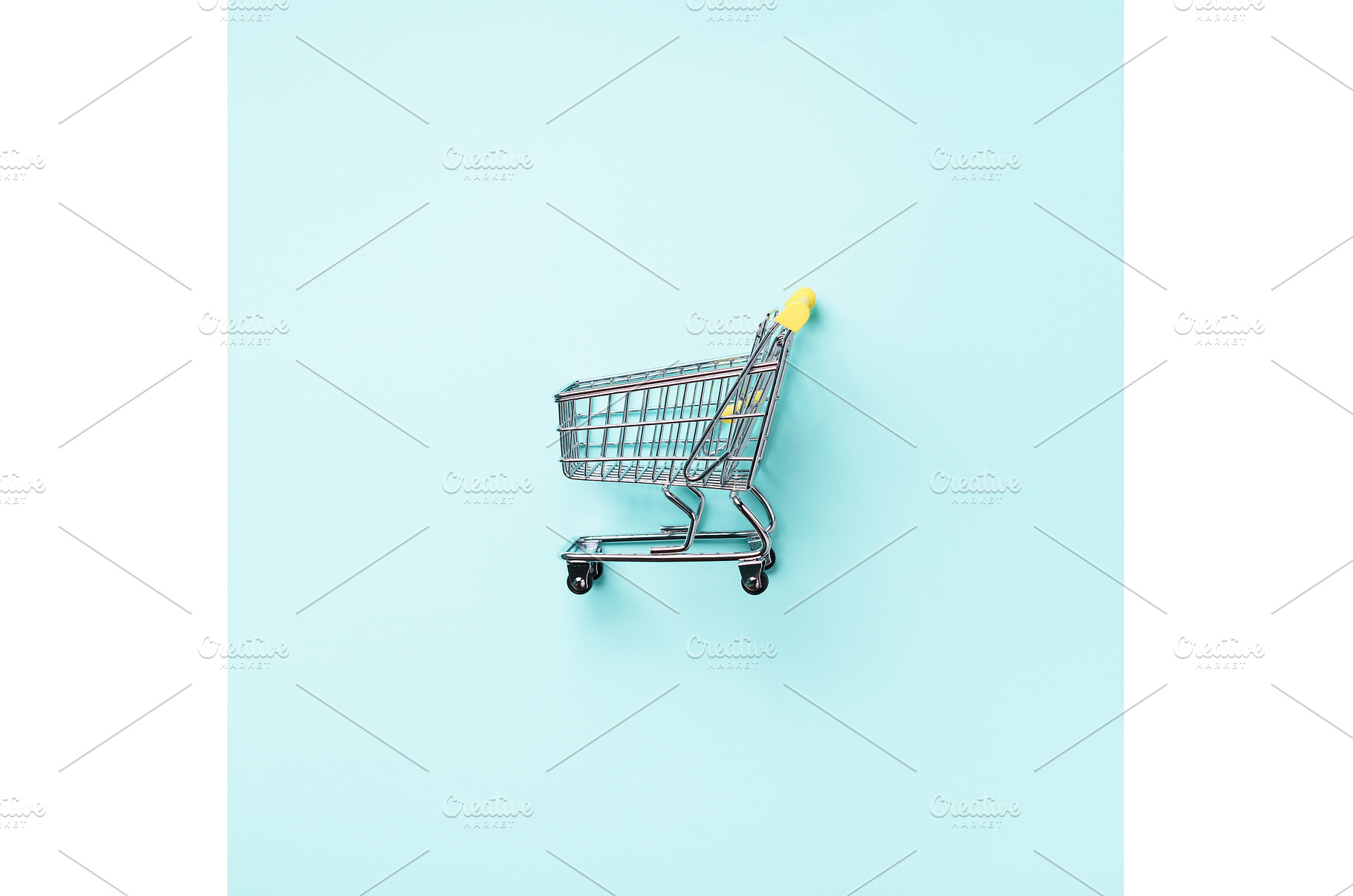 Shopping cart on blue background, a Food & Drink Photo by Enjoy Photo