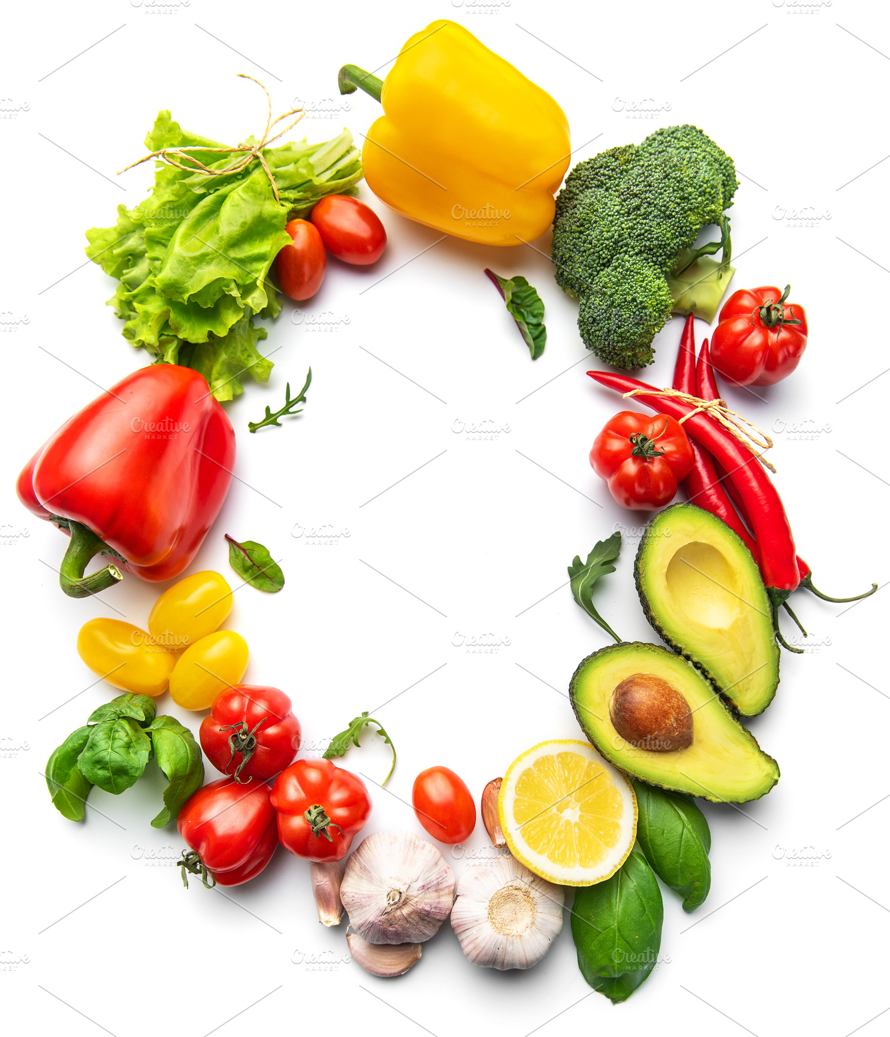 Fresh organic vegetables forming a circular frame, a Food & Drink Photo by Olena Rudo