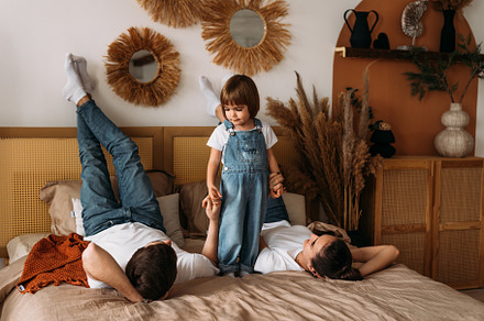 The family spends time at home, a Person Photo by SOTNIKOV_MISHA