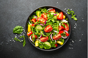 Salad with leaves, tomatoes, pepper, a Food & Drink Photo by Nadia-nb