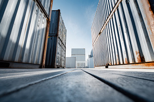 Containers stand in a shipping yard, a Photo by Beautiful things