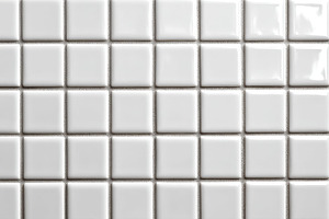 Glossy white square tiles on wall, a Background Photo by AlyaAnd