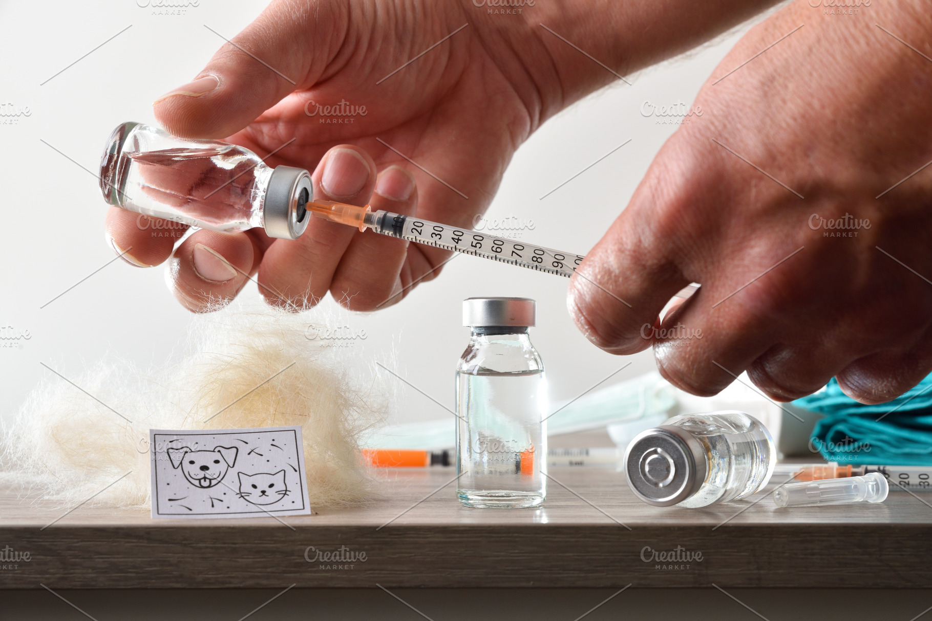 Nurse loading a syringe with vaccine for pet allergies, a Health & Medical Photo by Davizro's Market