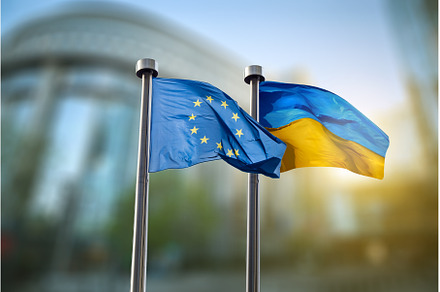 Flags of Ukraine and European Union, a Business Photo by Yaroslav Danylchenko