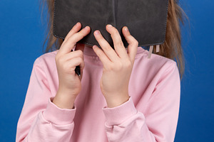 Child Reading Book on Blue Background, a Person Photo by Ales Munt