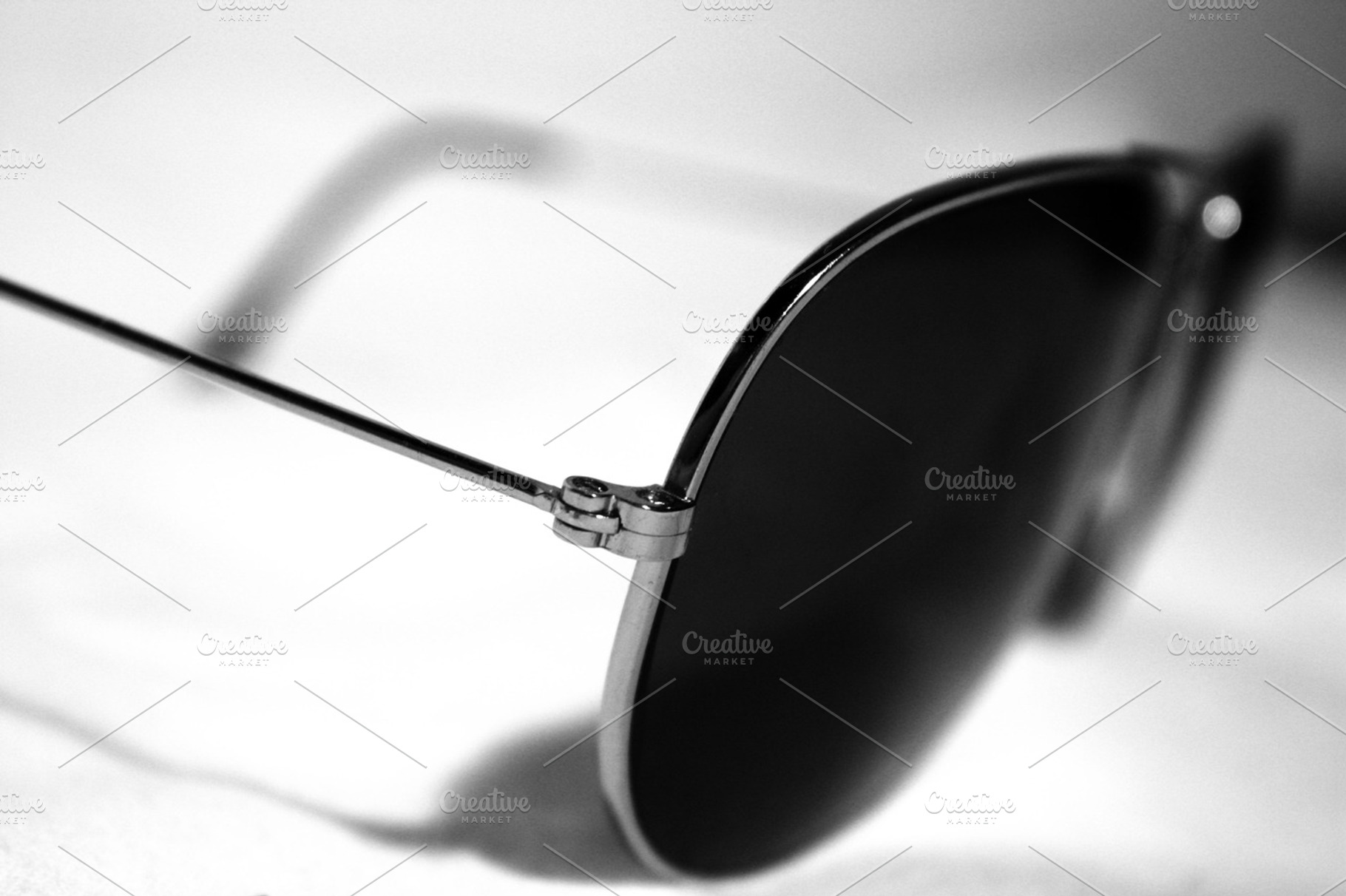Black sunglasses featuring glasses, sun, and sunglasses