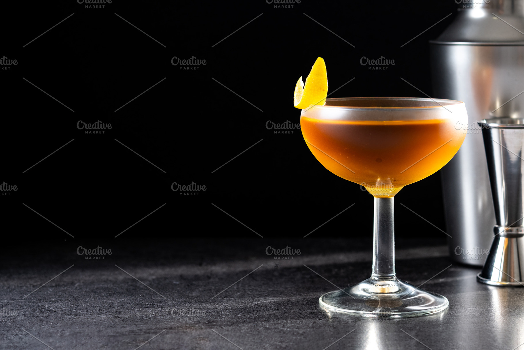 Paper plane cocktail on black slate background, a Food & Drink Photo by etorres69