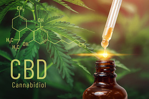 Cannabis cbd oil extracts in jars he containing cbd, oil, and cannabis