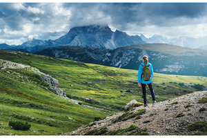 Female hiker enjoying the view of, a Person Photo by den-belitsky