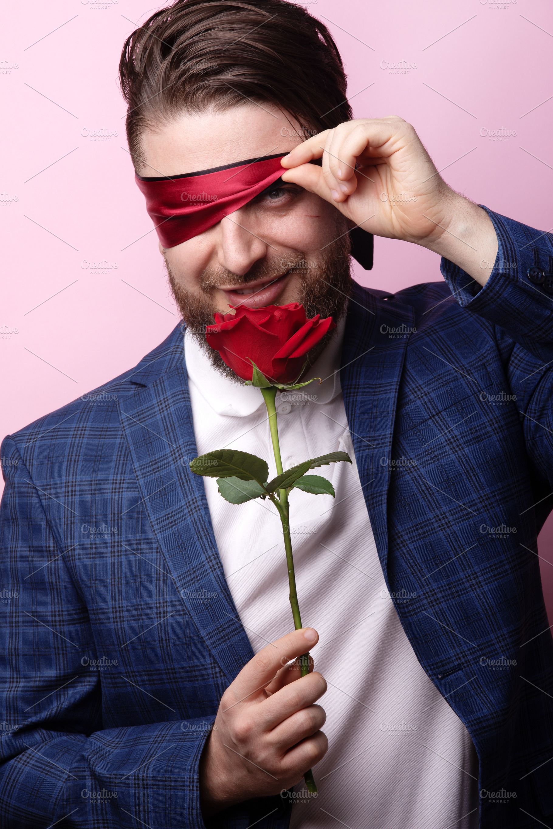 Man with Rose and Blindfold, a Person Photo by Ales Munt