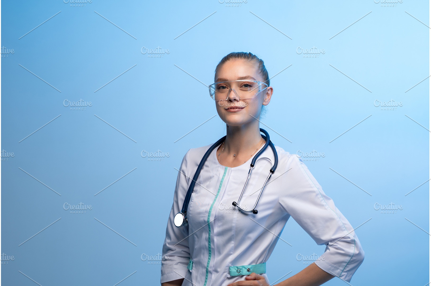Young female doctor wearing safety, a Health & Medical Photo by volodymyrshtun13795