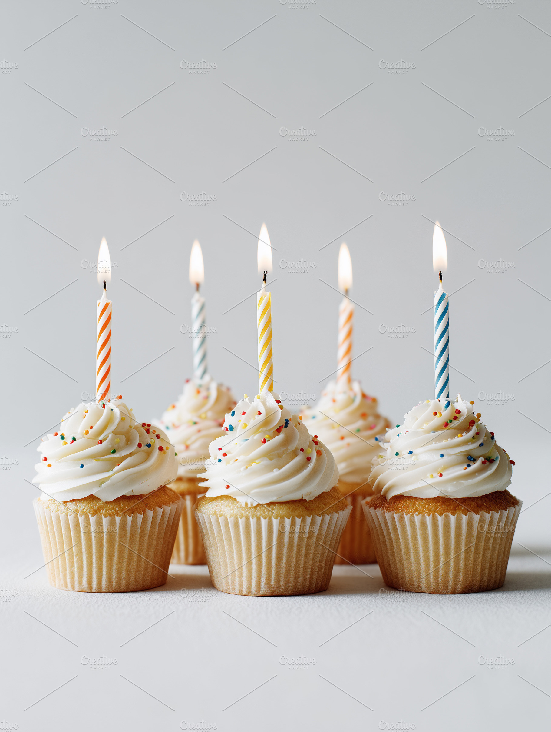 Row of vanilla cupcakes with white, a Food & Drink Photo by MistyDay