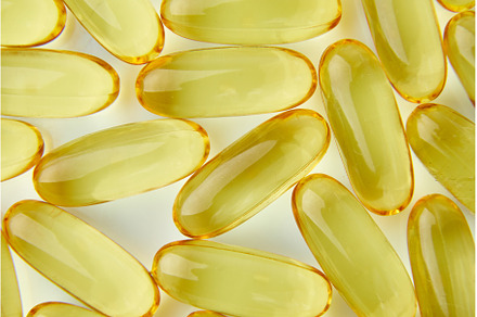 Flat lay fish oil capsules Omega 3, a Health & Medical Photo by IlliaBondarPhotography