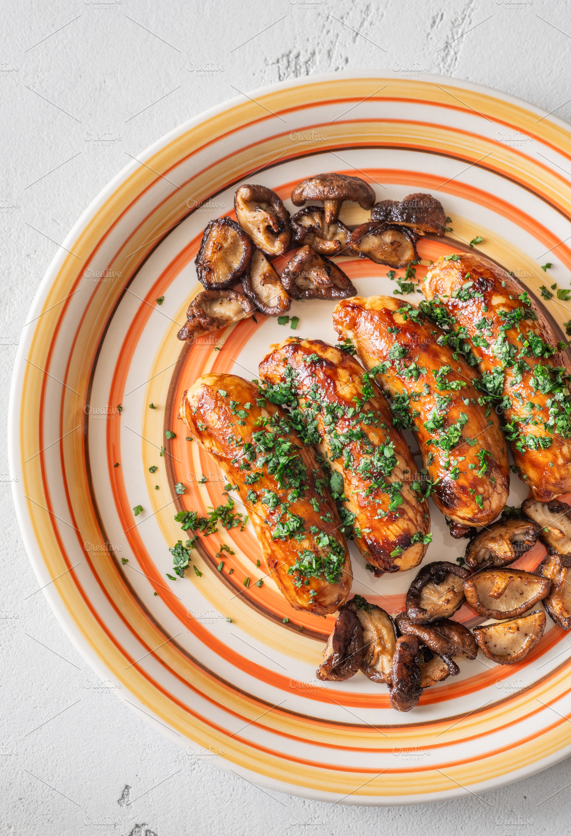 Glazed chicken sausages with herbs, a Food & Drink Photo by Alexander Prokopenko