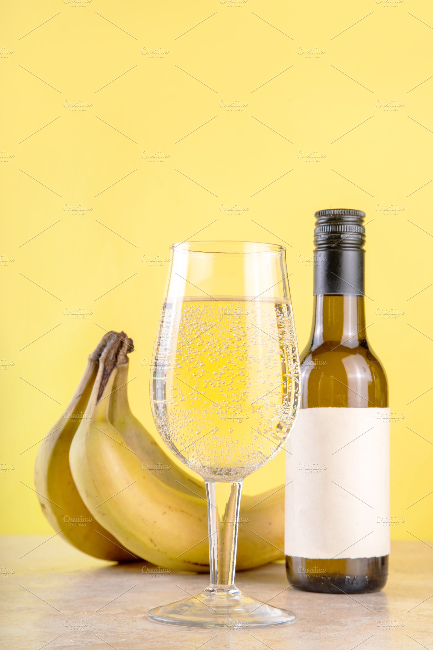 Delicious fermented banana wine craft alcohol drink, a Food & Drink Photo by Rimma