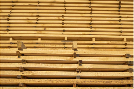 Storage of piles of wooden boards on, an Industrial Photo by volodymyrshtun13795