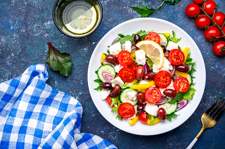 Tasty Greek salad with feta cheese, kalamata olives, tomatoes, p, a Food & Drink Photo by 5PH