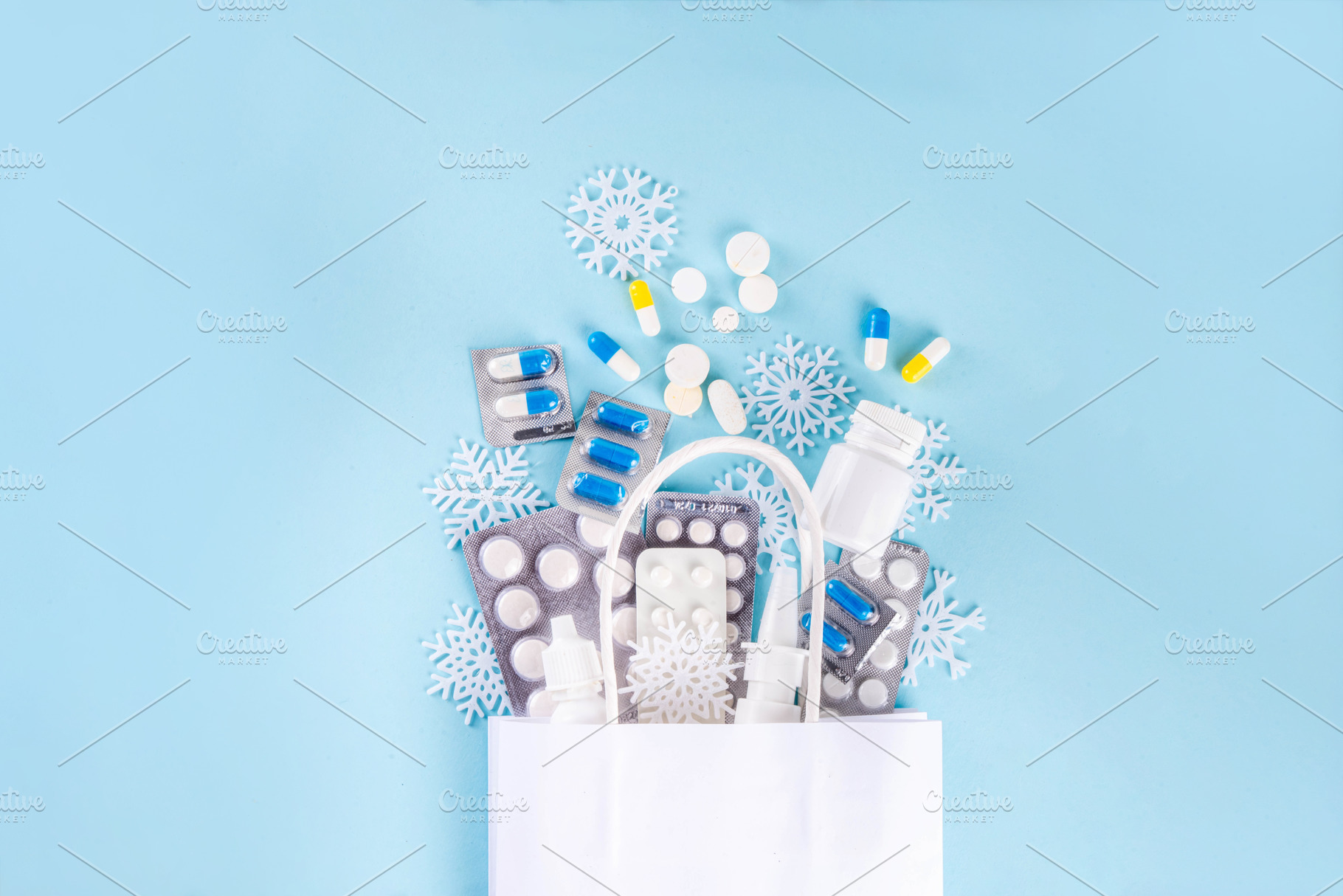 Shopping bag with different pharmacy pills, Seasonal winter medi, a Health & Medical Photo by Rimma