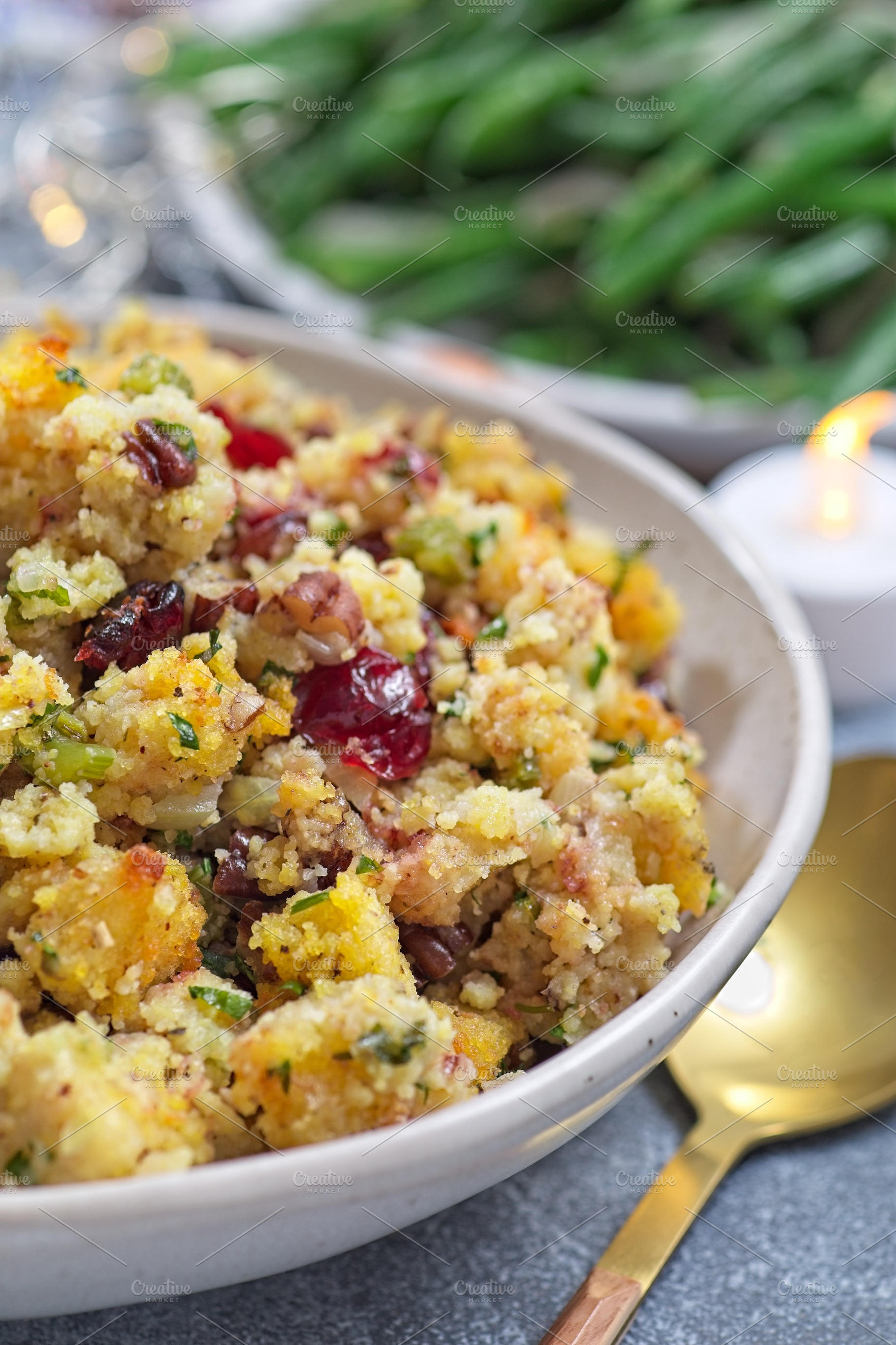 Traditional Cranberry pecan cornbread dressing for poultry or meat stuffing, in, a Food & Drink Photo by iuliia_n