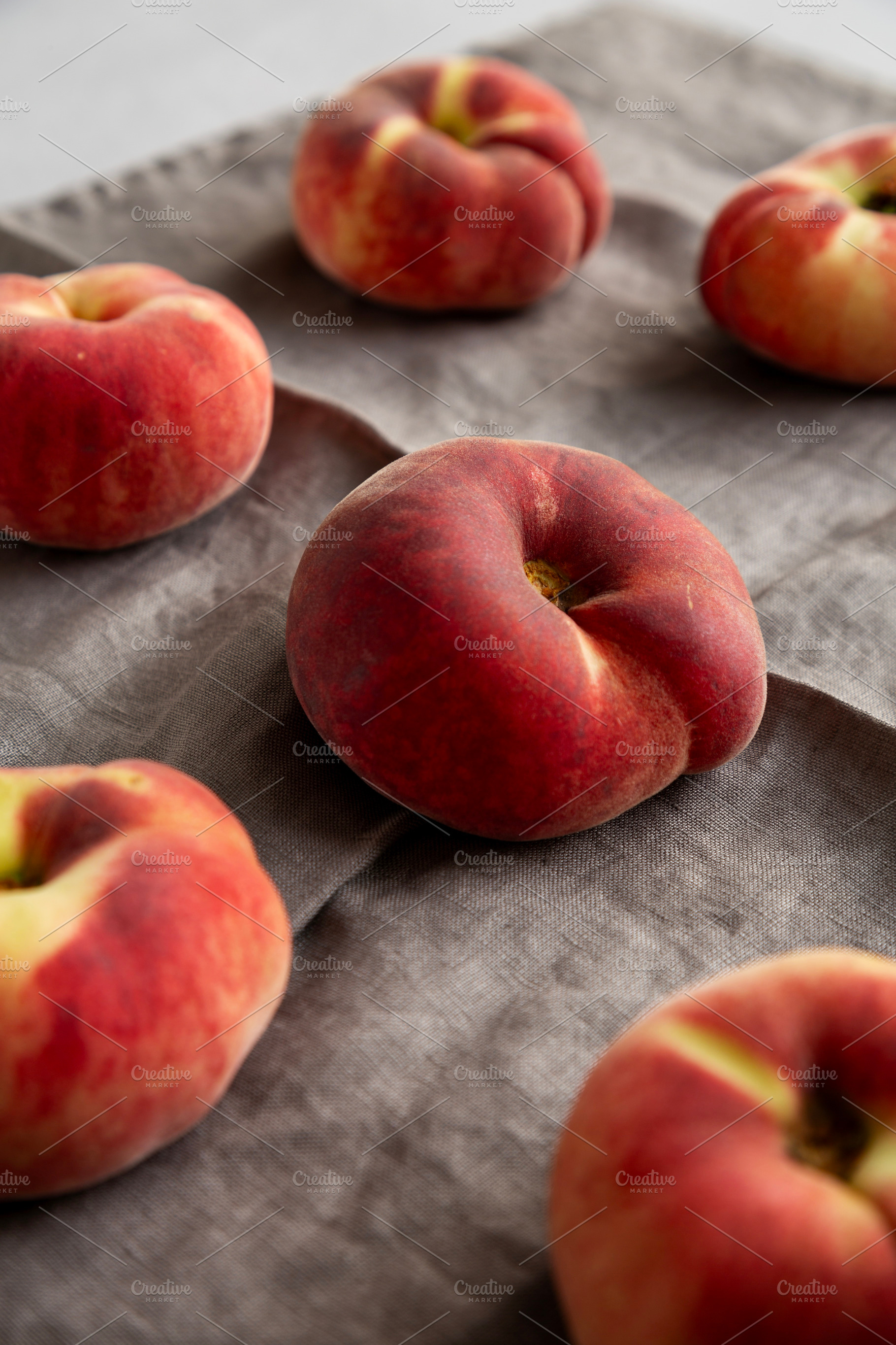 Fresh juicy ripe fig peaches, side view., a Food & Drink Photo by LiudmylaChuhunova