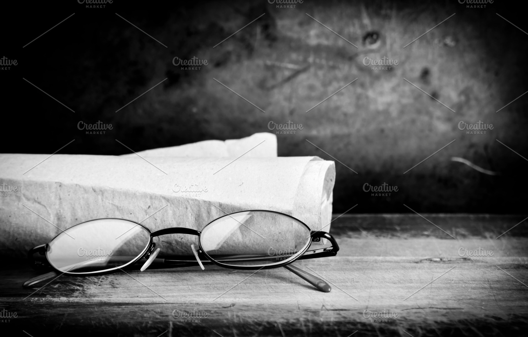 Old Glasses on Desk, a School & Education Photo by THP Creative