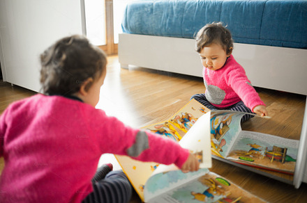 Toddler baby girl playing with fairy