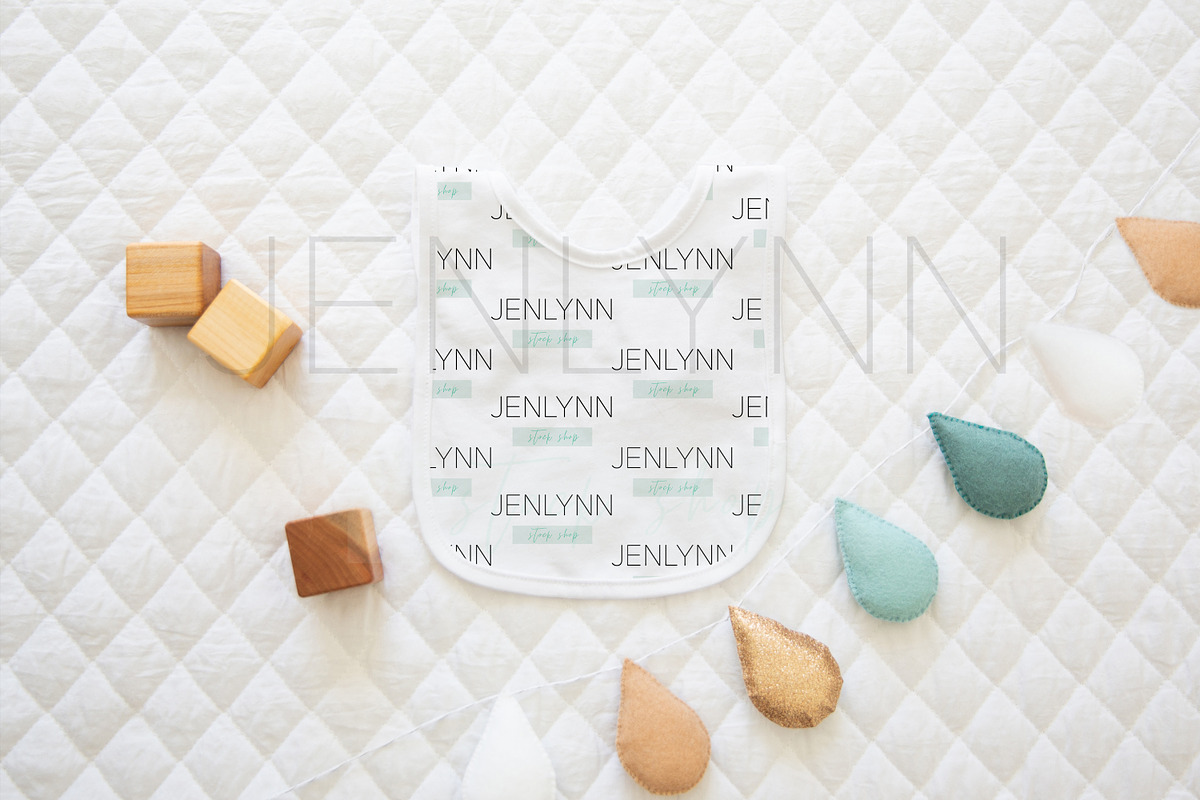 Bib Flatlay Mockup #14, a Product Mockup by JENLYNN Stock Shop (Photo 1 of 8)