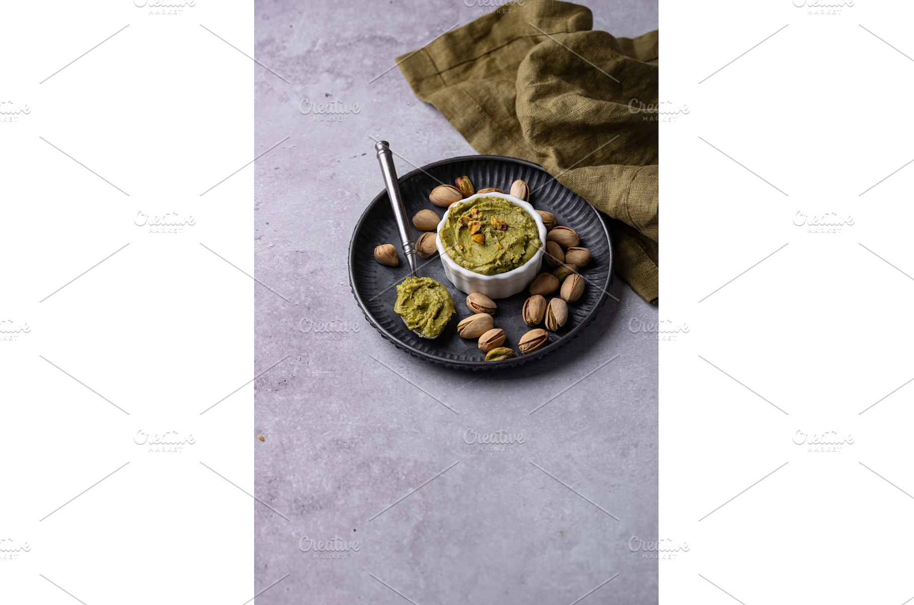 Sweet pistachio cream in a bowl, a Food & Drink Photo by Yulia Furman