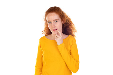 Portrait of pensive redhead girl wearing a yellow t-shirt, a Person Photo by José Manuel Gelpi