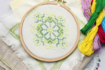 Embroidery with colored threads and various sewing accessories, an Arts & Entertainment Photo by Olena Rudo