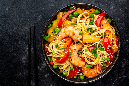 Stir fry noodles with shrimps, red and yellow paprika, green pea, a Food & Drink Photo by 5PH