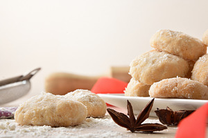 Detail of freshly made anise cookies with kitchen utensils, a Food & Drink Photo by Davizro's Market