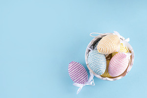 Happy Easter minimal background with pastel colored holiday eggs, a Holiday Photo by Rimma