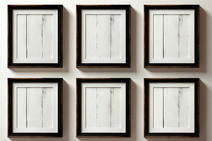Elegant Set of Black Wooden Photo Frames on a White Wall, a Photo by AS photostudio