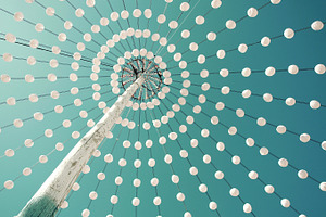 White decorative lanterns containing lantern, lighting equipment, and