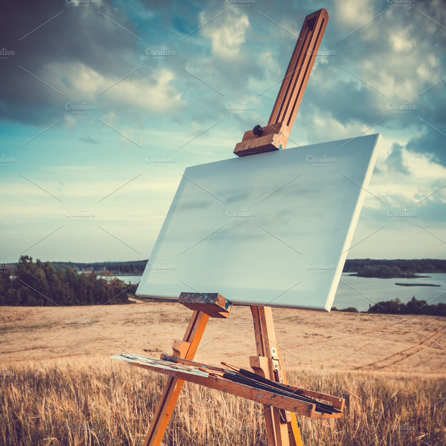 Blank canvas rests on easel outdoors, an Arts & Entertainment Photo by chamillewhite