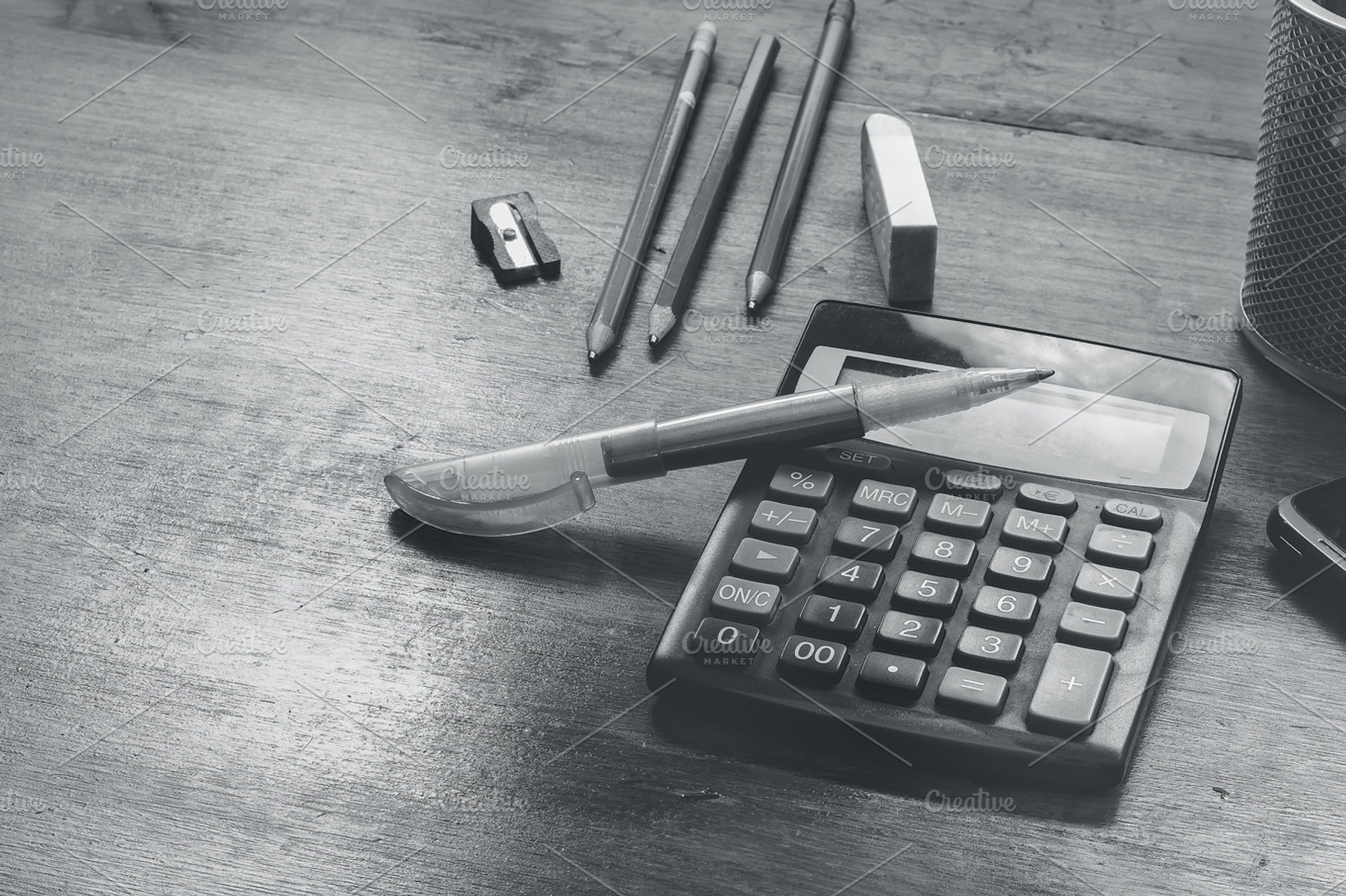 calculator and pencil on a table, a Business Photo by JCB Photogr@phics