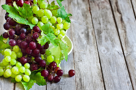 Green and red grape containing grapevine, food, and fruit