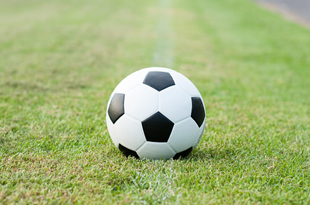 Ball in grass stock photo containing football and grass, a Sports & Recreation Photo by a454